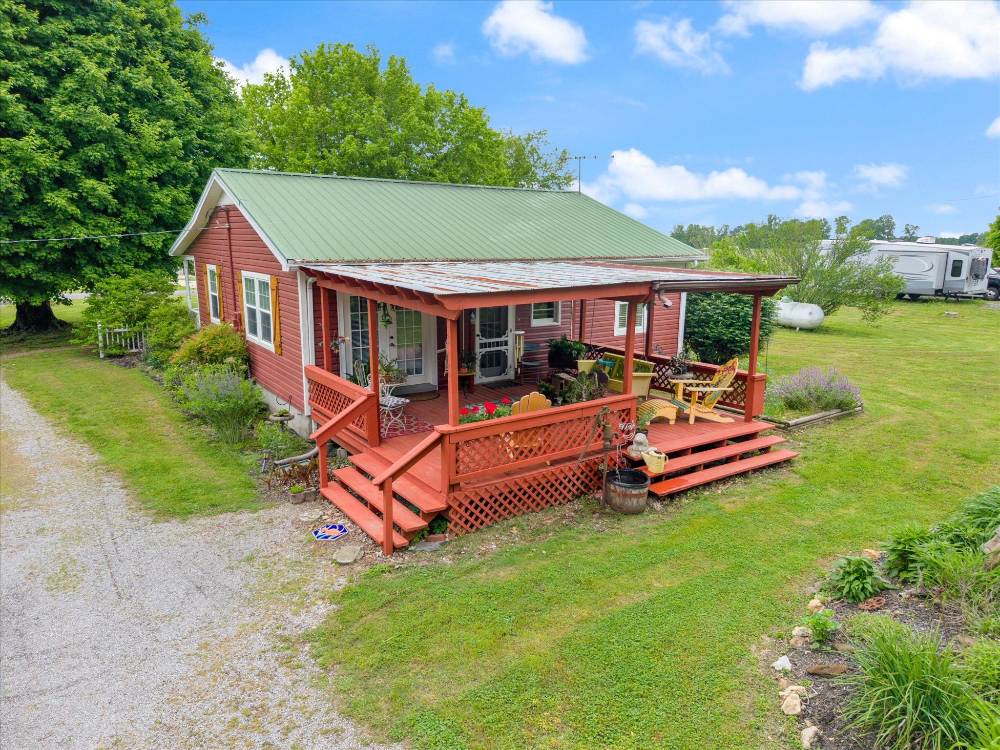 126 Blackey Bandy Road Bethpage, TN 37022 - Photo 22 of 37 an aerial view of a house with swimming pool a patio and yard