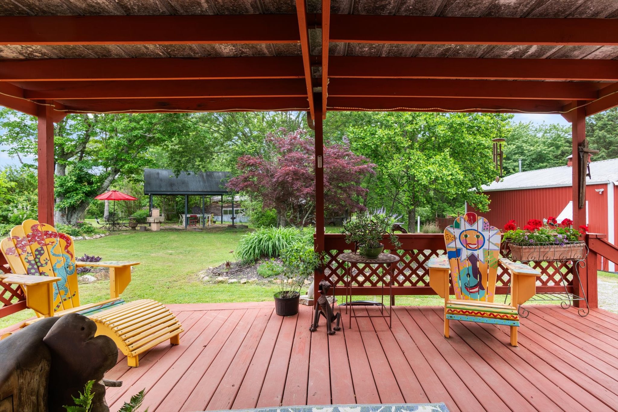 126 Blackey Bandy Road Bethpage, TN 37022 - Photo 26 of 37 a view of a chairs and table on the wooden roof deck