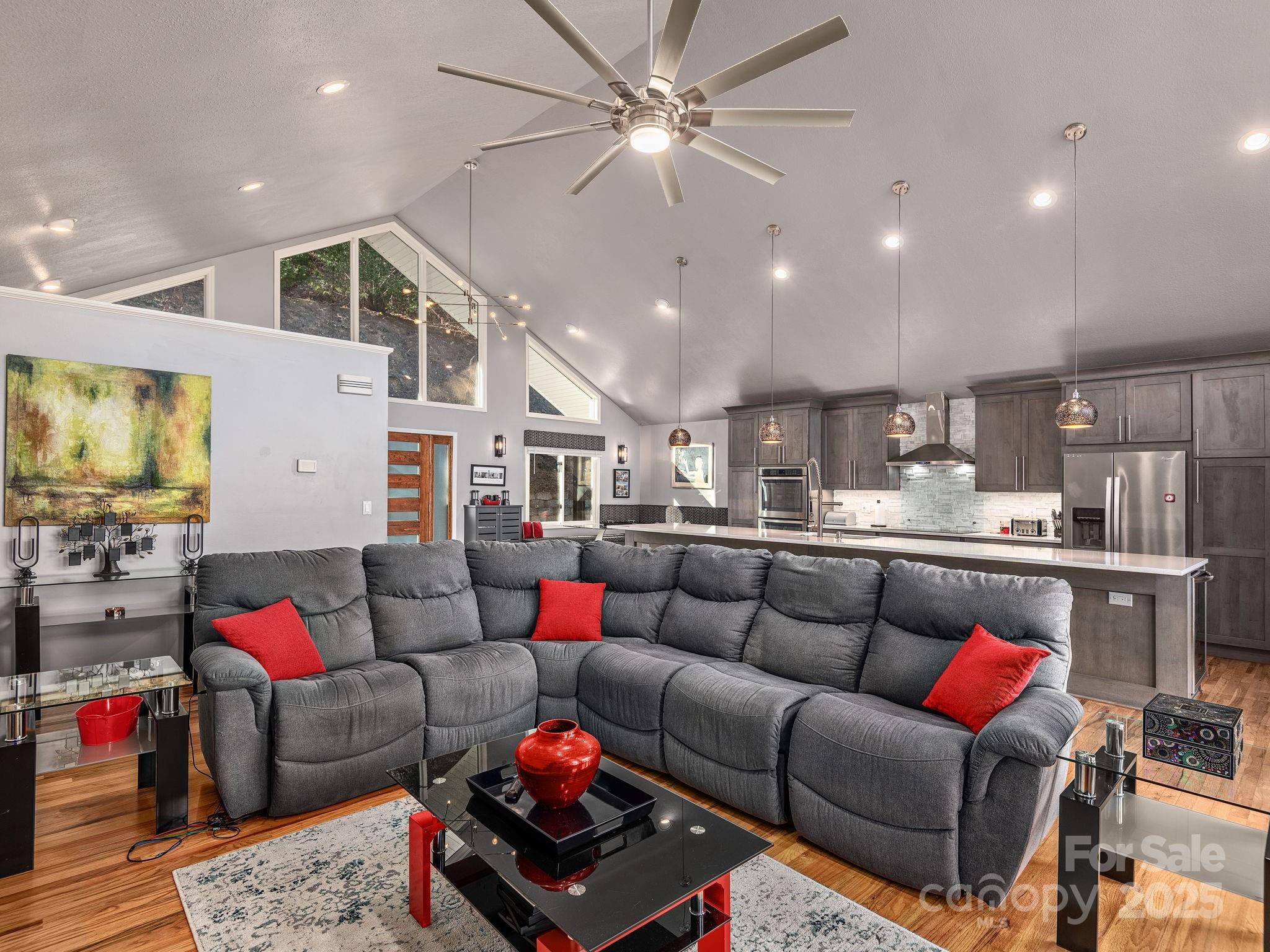 1591 Chestnut Flats Road Waynesville, NC 28786 - Photo 14 of 40 a living room with furniture and kitchen view