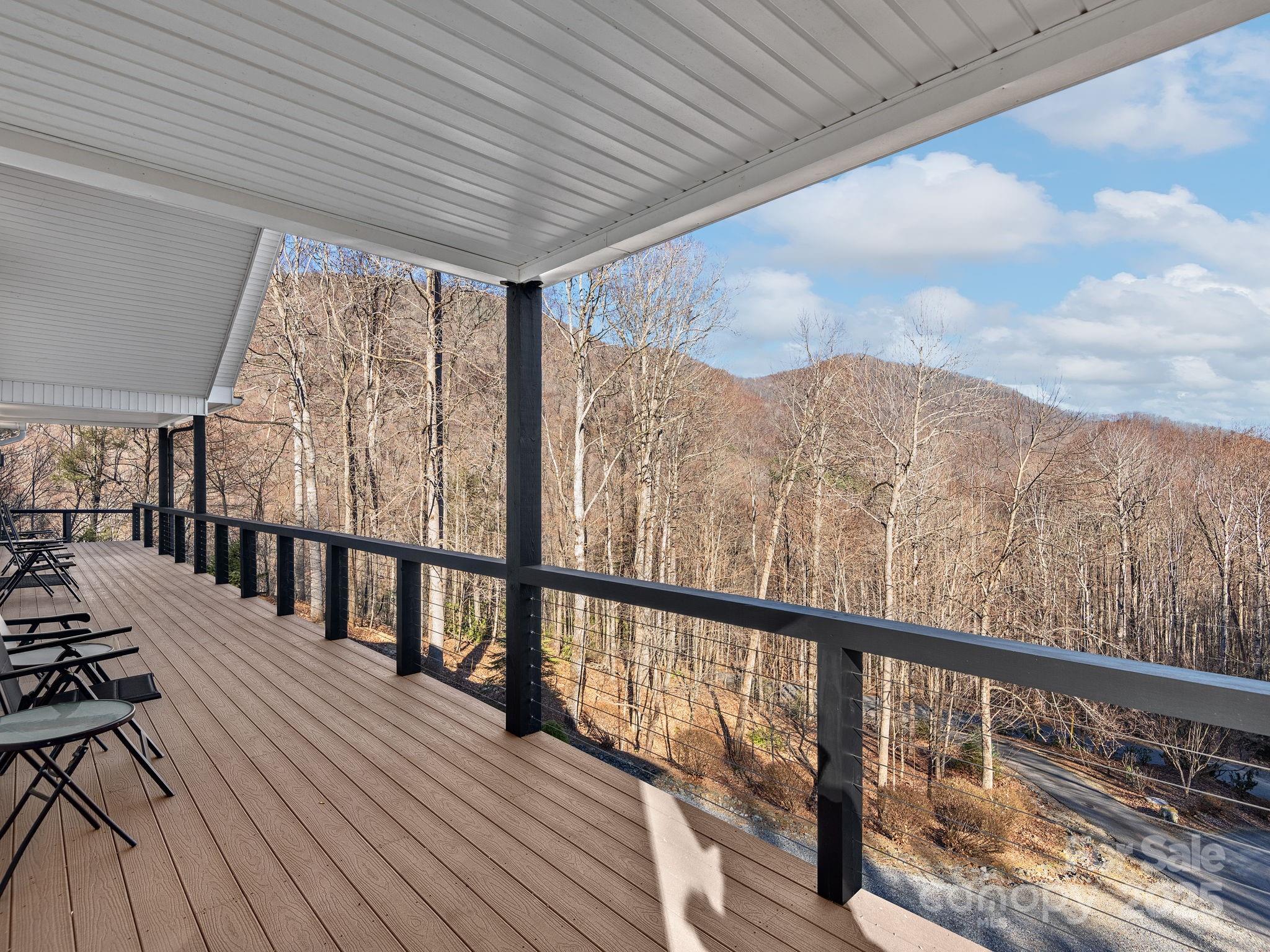 1591 Chestnut Flats Road Waynesville, NC 28786 - Photo 15 of 40 a view of balcony with furniture