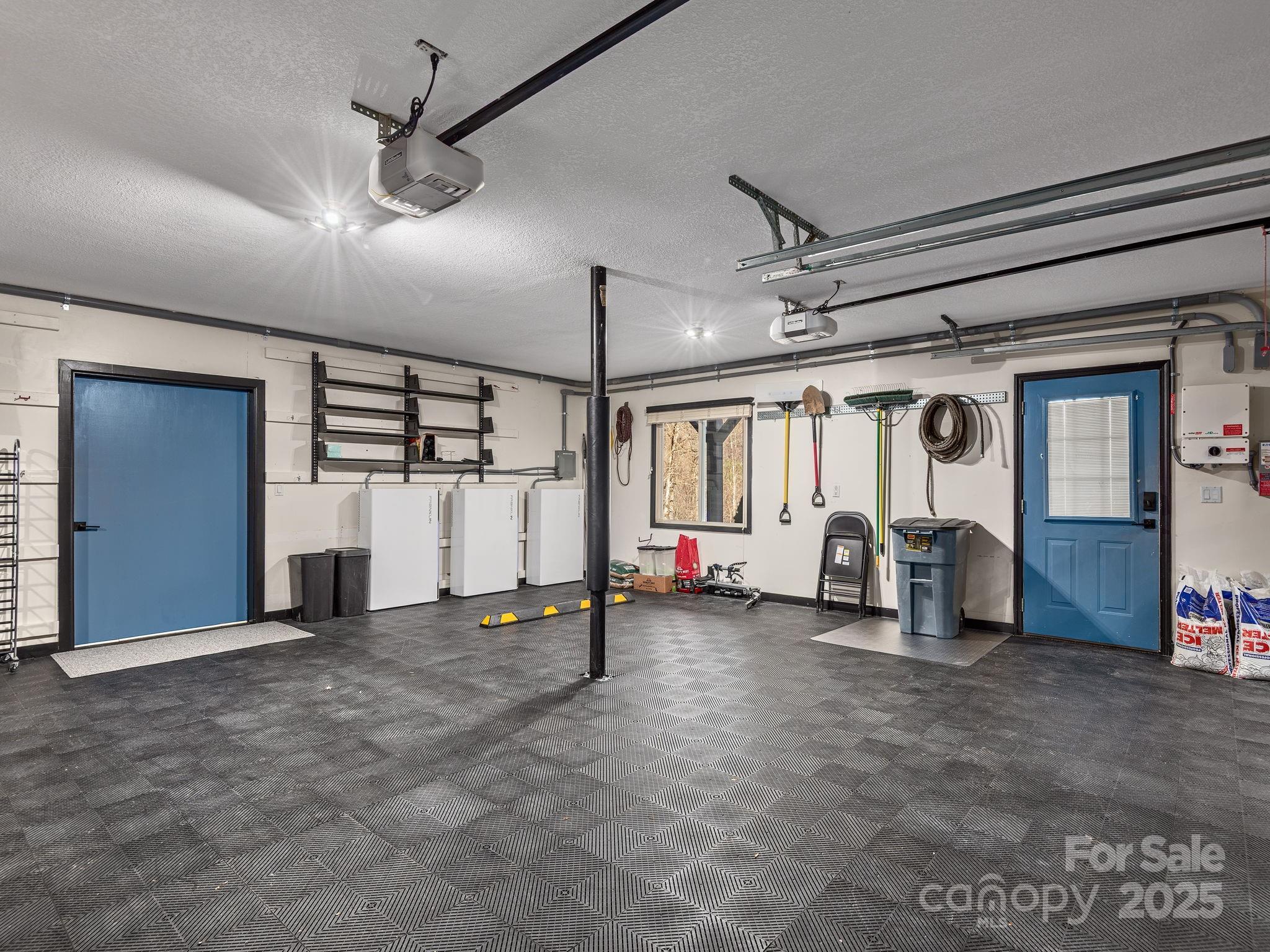 1591 Chestnut Flats Road Waynesville, NC 28786 - Photo 32 of 40 a view of a big room with air conditioner duct and furniture