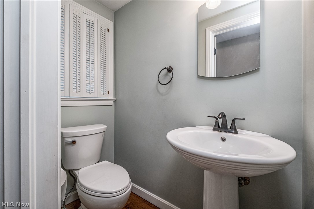 3108 Midvale Road Northwest Canton, OH 44718 - Photo 15 of 21 1/2 bath off hall near kitchen and family room. Ideal spot.