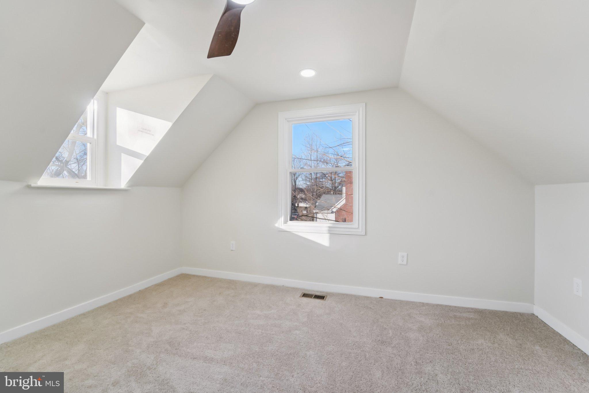 27 Pelczar Avenue Baltimore, MD 21221 - Photo 20 of 40 an empty room with a window