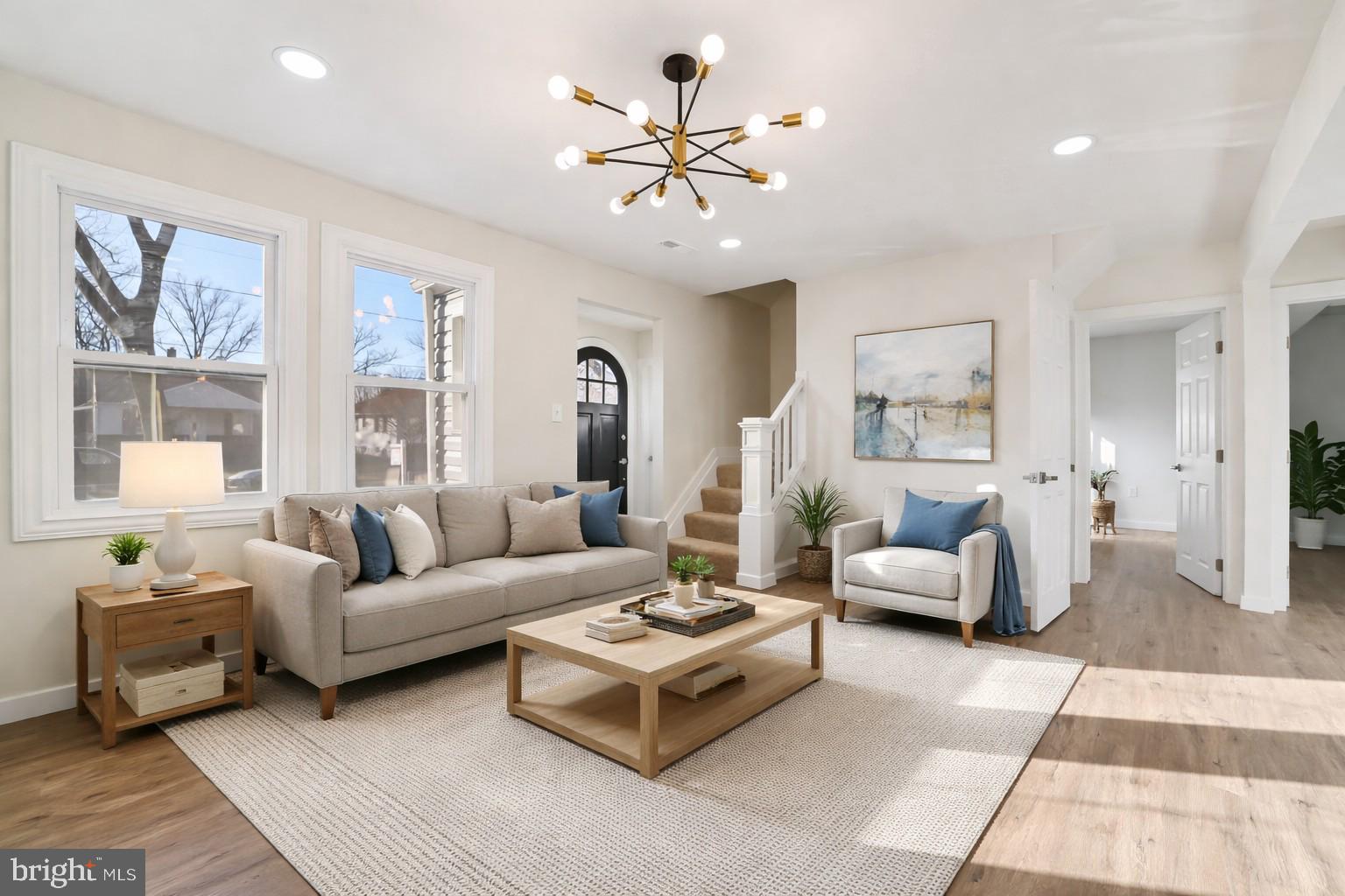 27 Pelczar Avenue Baltimore, MD 21221 - Photo 2 of 40 a living room with furniture and a large window