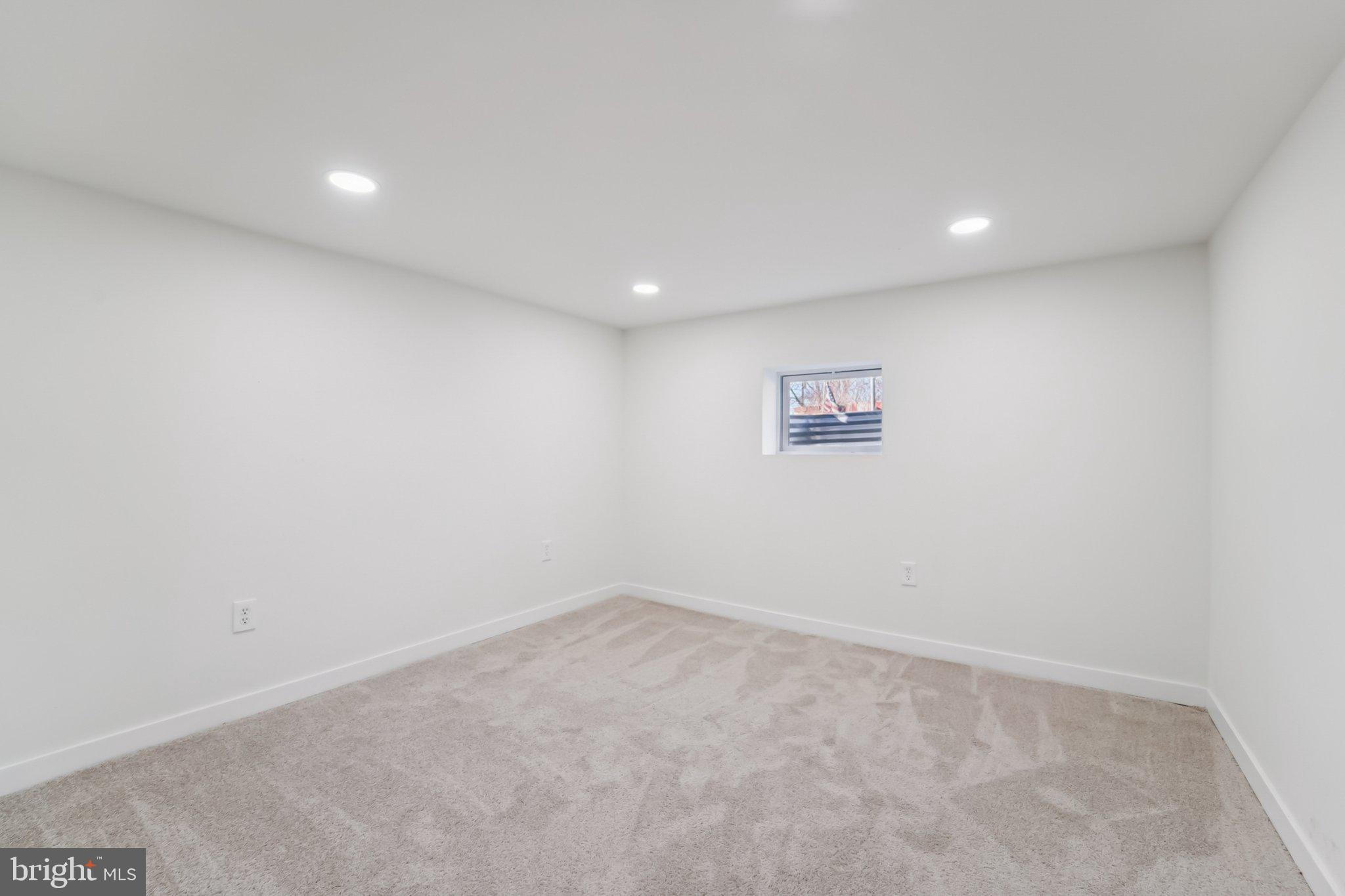 27 Pelczar Avenue Baltimore, MD 21221 - Photo 30 of 40 an empty room with a hallway