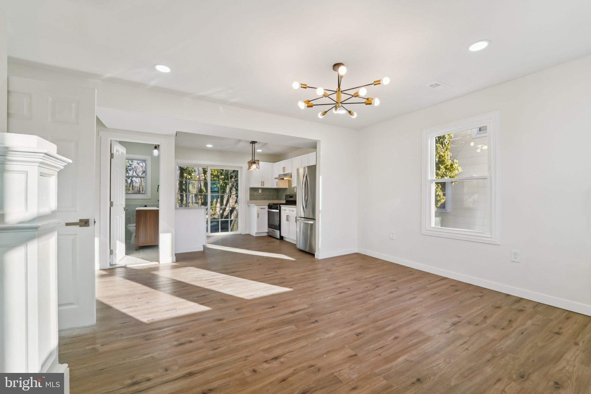 27 Pelczar Avenue Baltimore, MD 21221 - Photo 8 of 40 a view of an empty room with a window