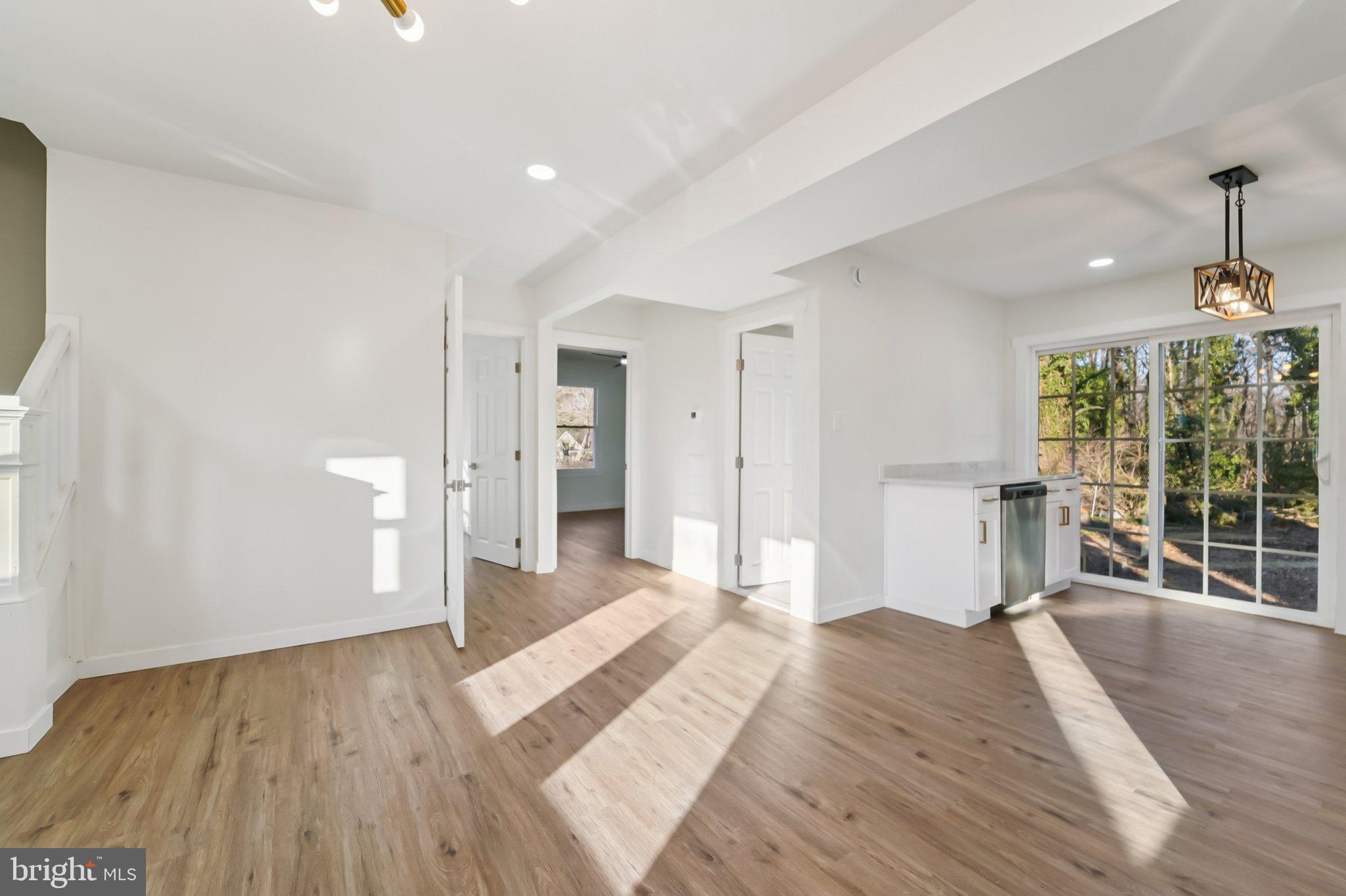 27 Pelczar Avenue Baltimore, MD 21221 - Photo 10 of 40 a bedroom with a bed and a window