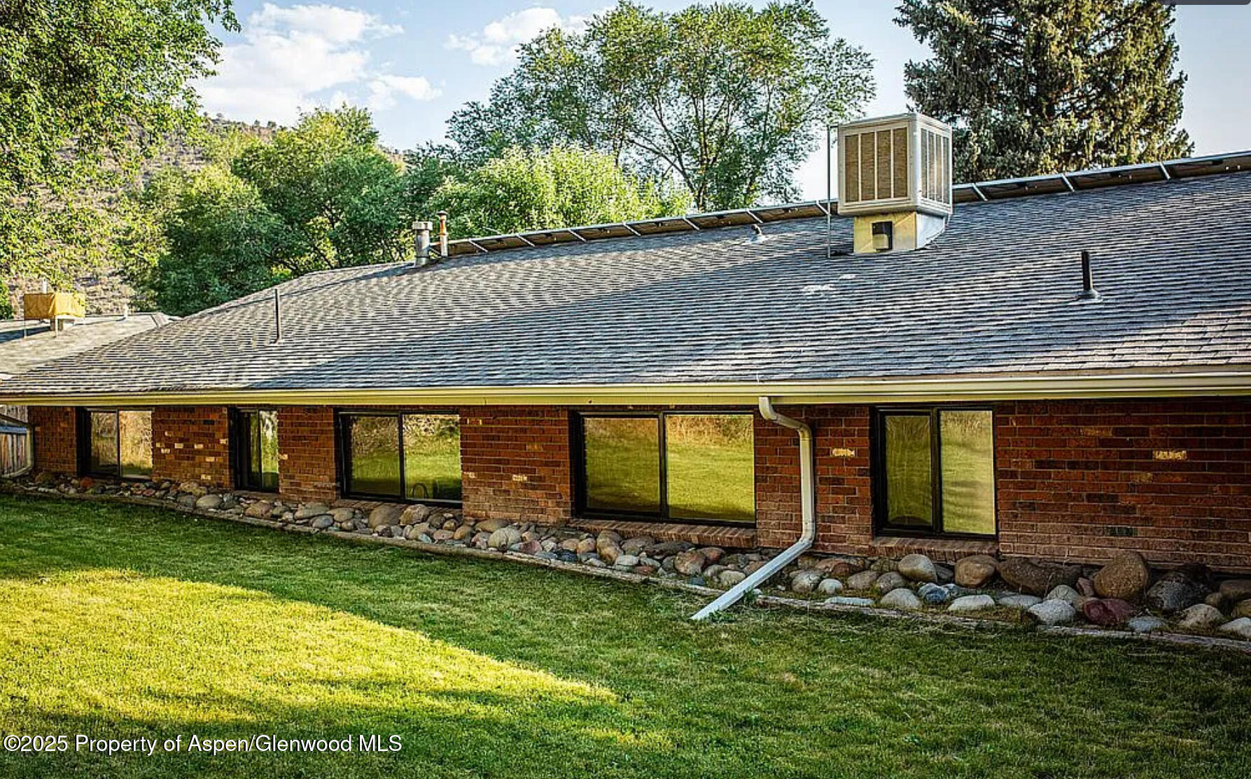 228 North 7th Street New Castle, CO 81647 - Photo 5 of 24 a front view of house with yard