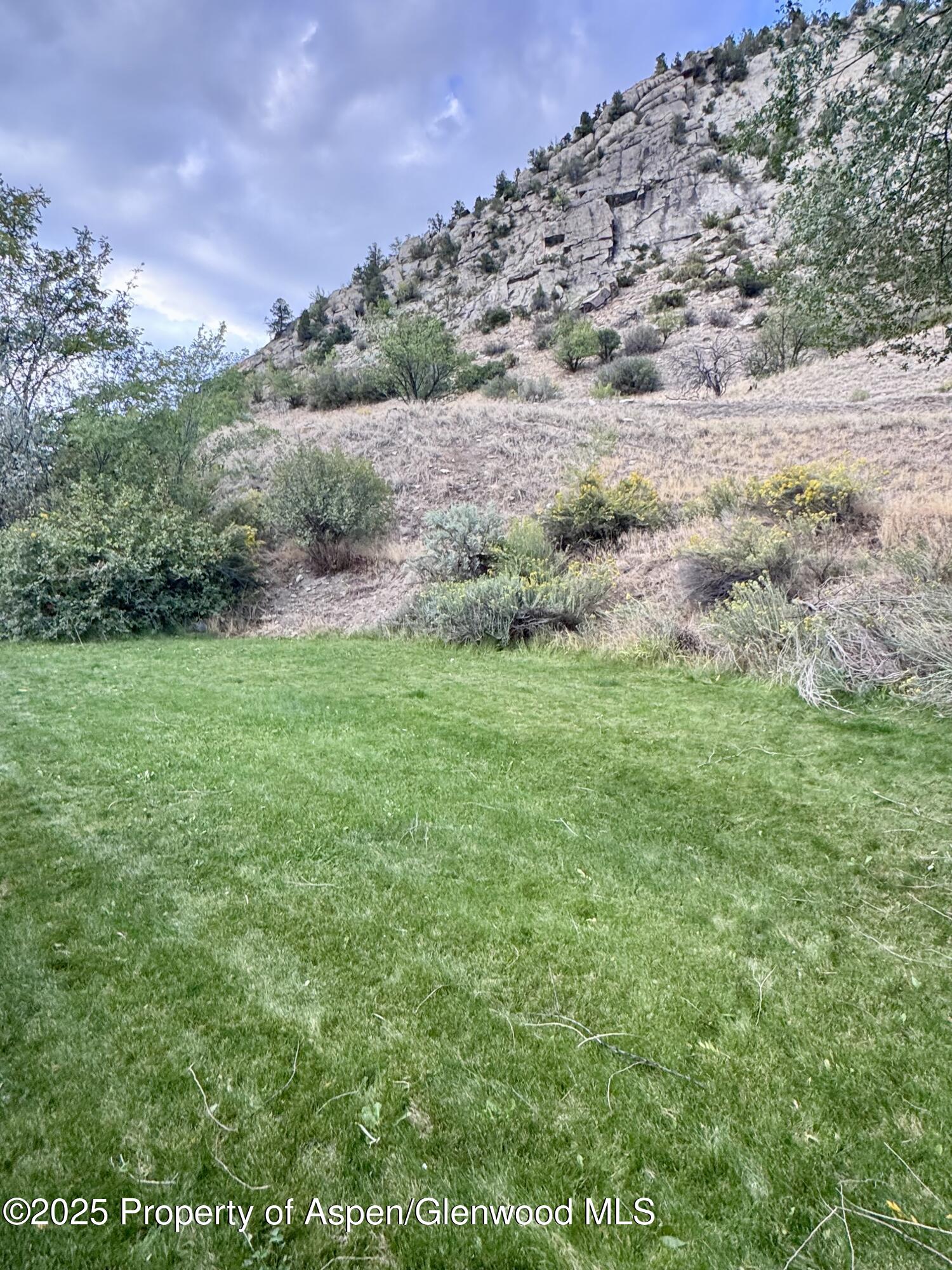 228 North 7th Street New Castle, CO 81647 - Photo 7 of 24 a view of a field with an outdoor space