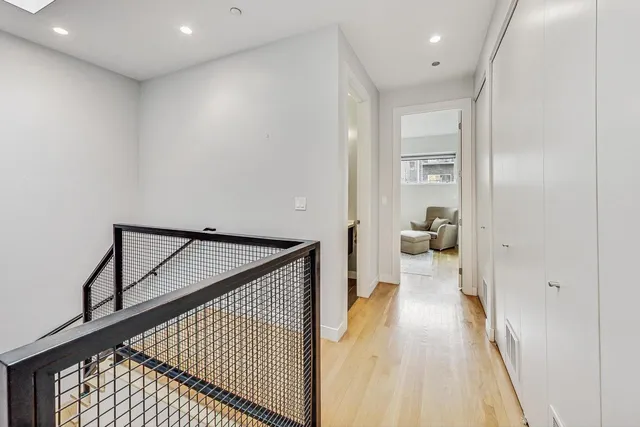 a view of a hallway with a couch