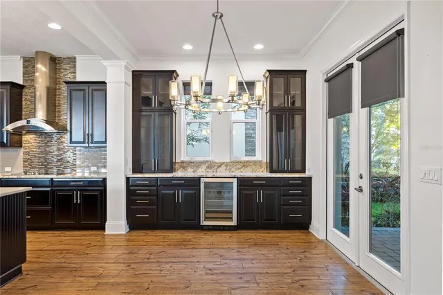 a kitchen with appliances and cabinets