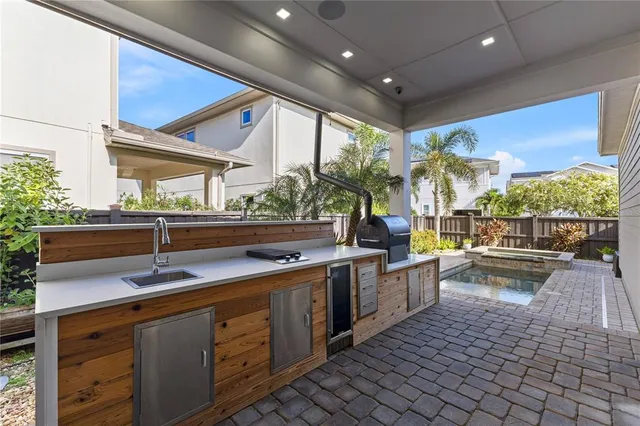 a view of a lake with houses in the back