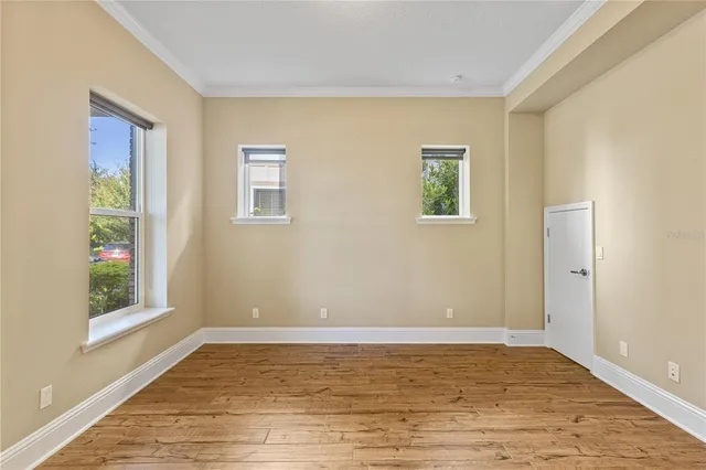 a large kitchen with stainless steel appliances granite countertop a stove and refrigerator