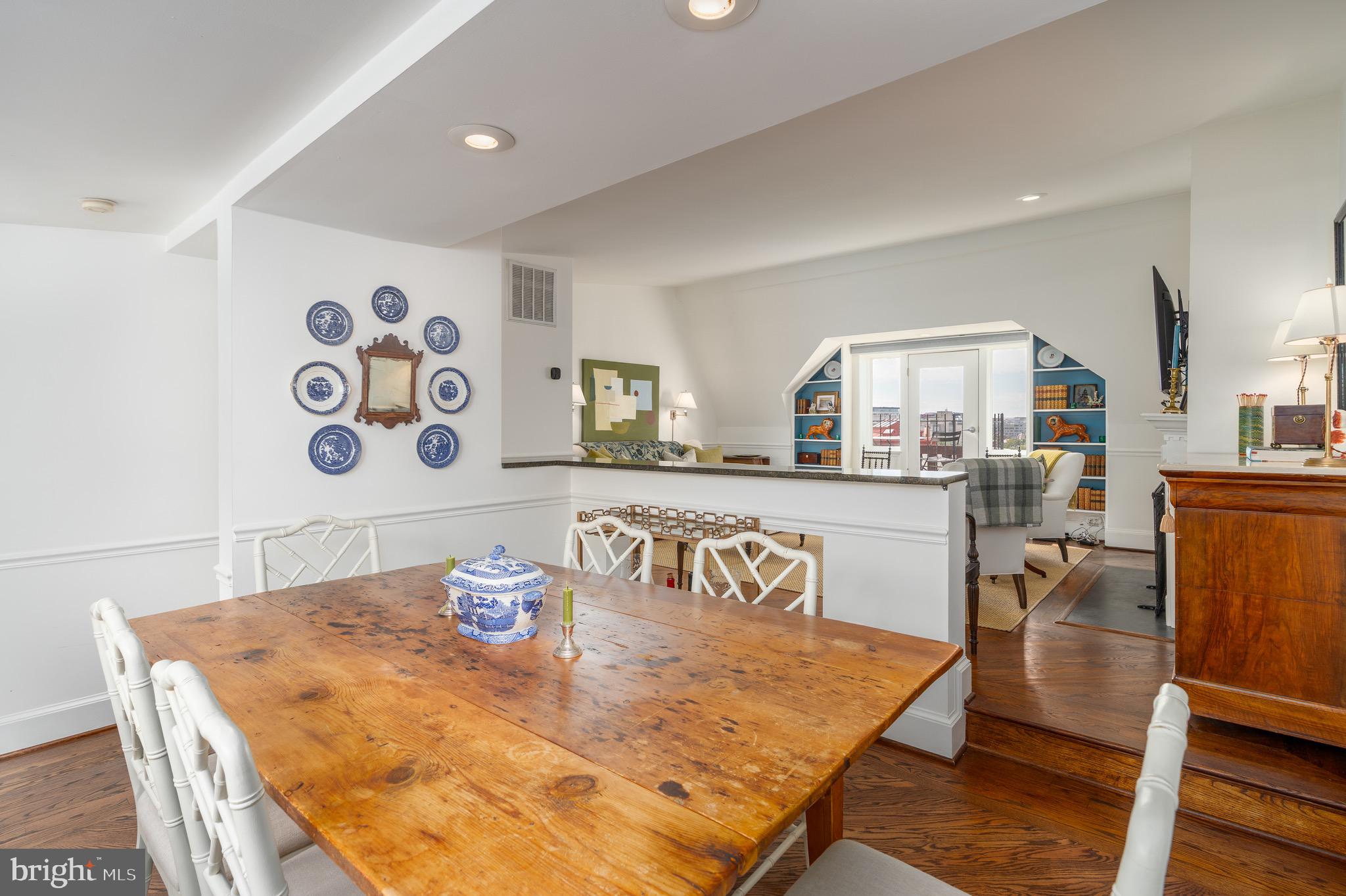 2115 S Street Northwest, Unit 3A Washington, DC 20008 - Photo 13 of 26 a living room with dining table