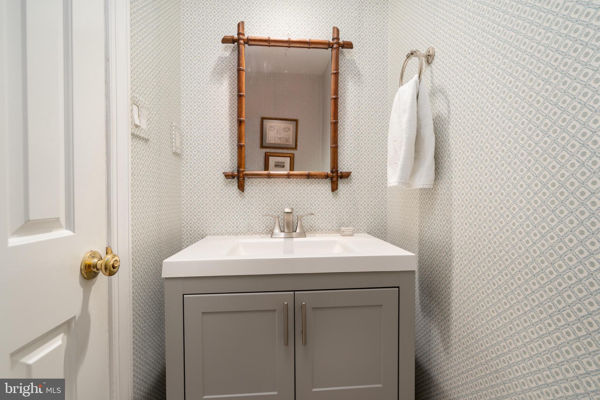 2115 S Street Northwest, Unit 3A Washington, DC 20008 - Photo 15 of 26 a bathroom with a sink vanity and a mirror