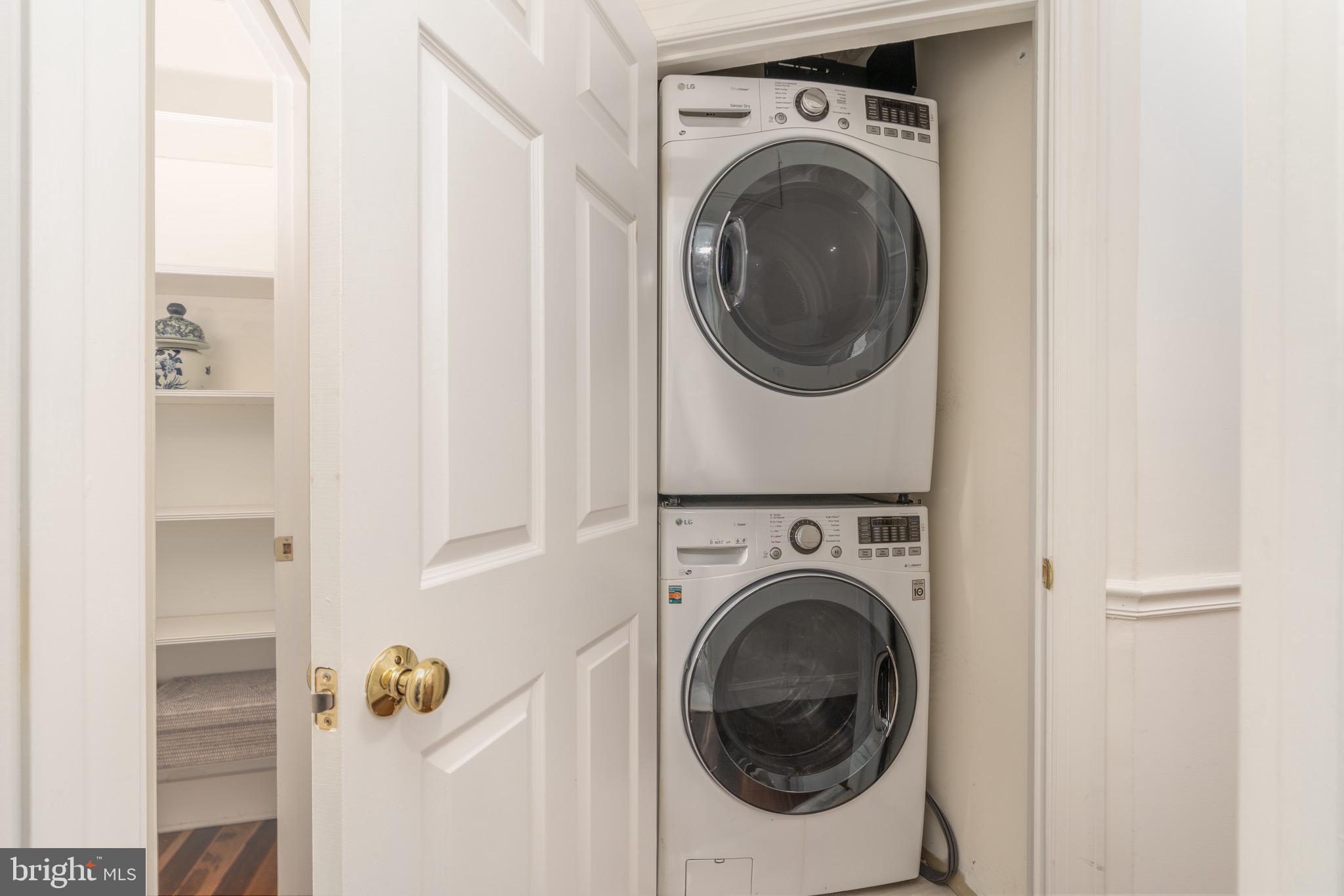 2115 S Street Northwest, Unit 3A Washington, DC 20008 - Photo 25 of 26 a utility room with dryer and washer