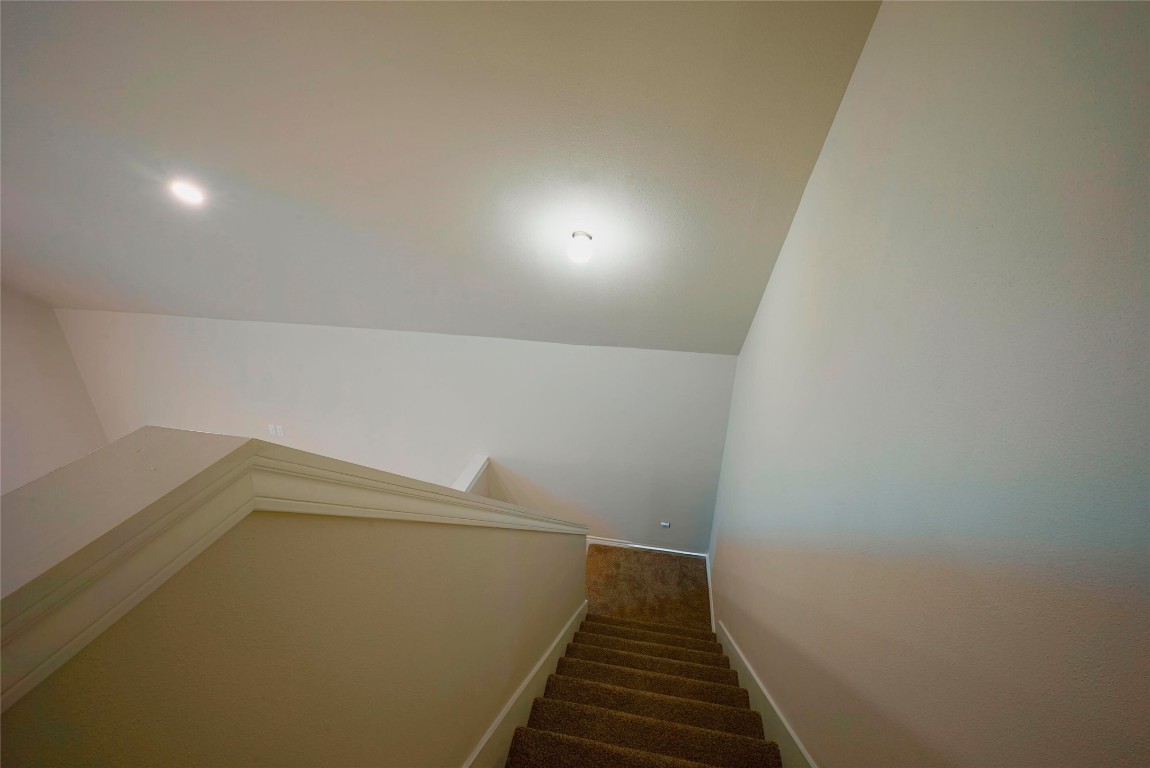 233 Harrison Street Longview, TX 75601 - Photo 17 of 24 a view of a hallway with stairs