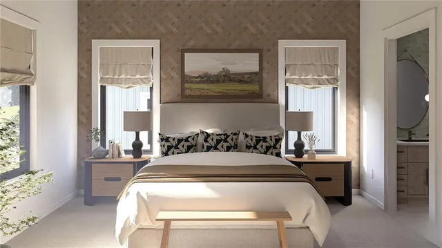 a bedroom with a bed and a painting on the wall