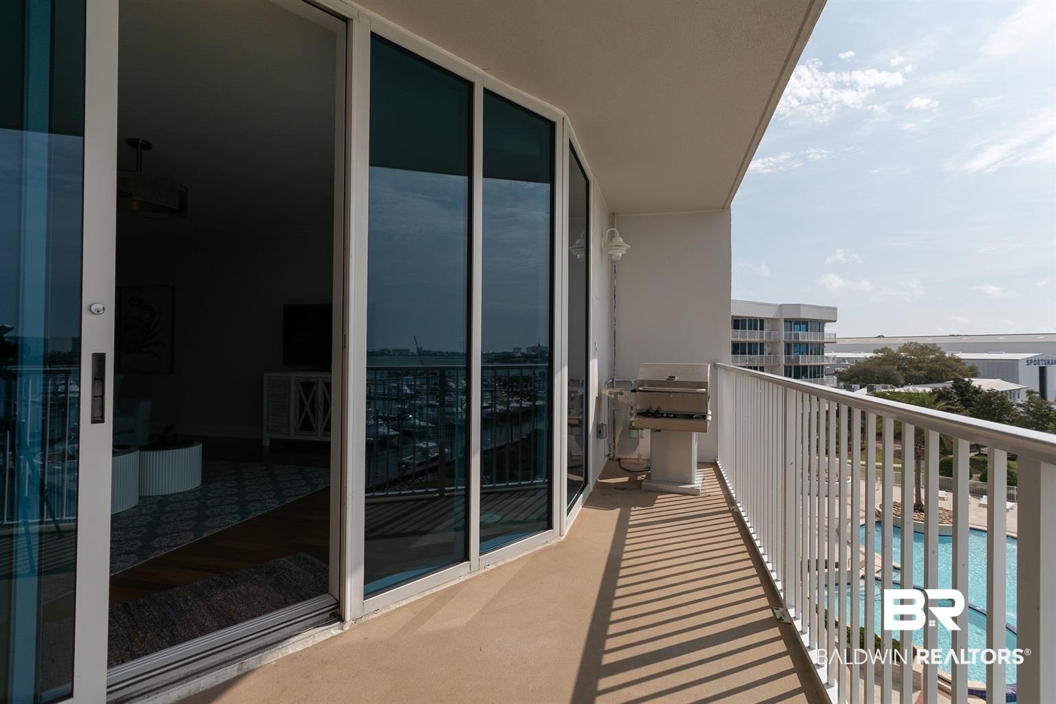 27800 Canal Road, Unit 411 Orange Beach, AL 36561 - Photo 38 of 49 Expansive private balcony with direct access via multiple sliding glass doors