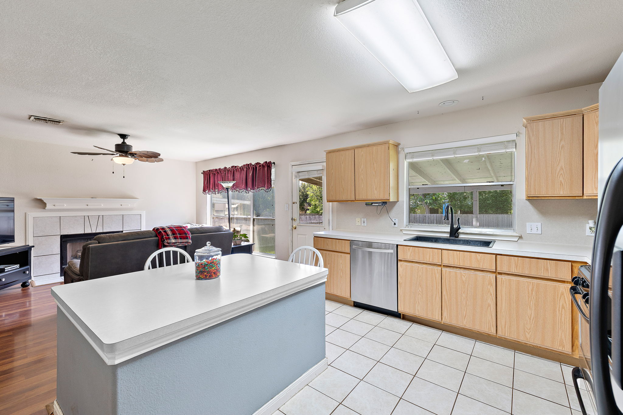 615 Runners Ridge Pflugerville, TX 78660 - Photo 14 of 32 a kitchen with a sink cabinets and window