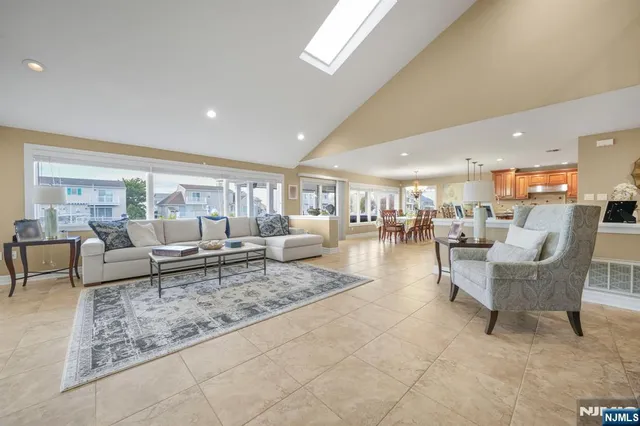 a living room with furniture and a table