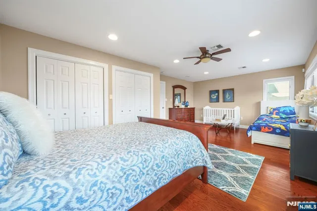 a bed room with a bed and furniture