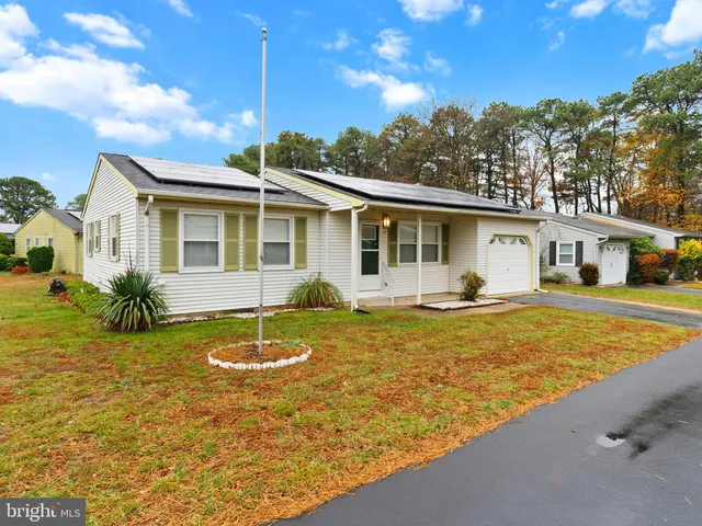 a view of a house with a swimming pool