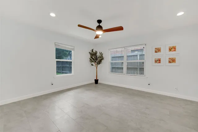 an empty room with windows