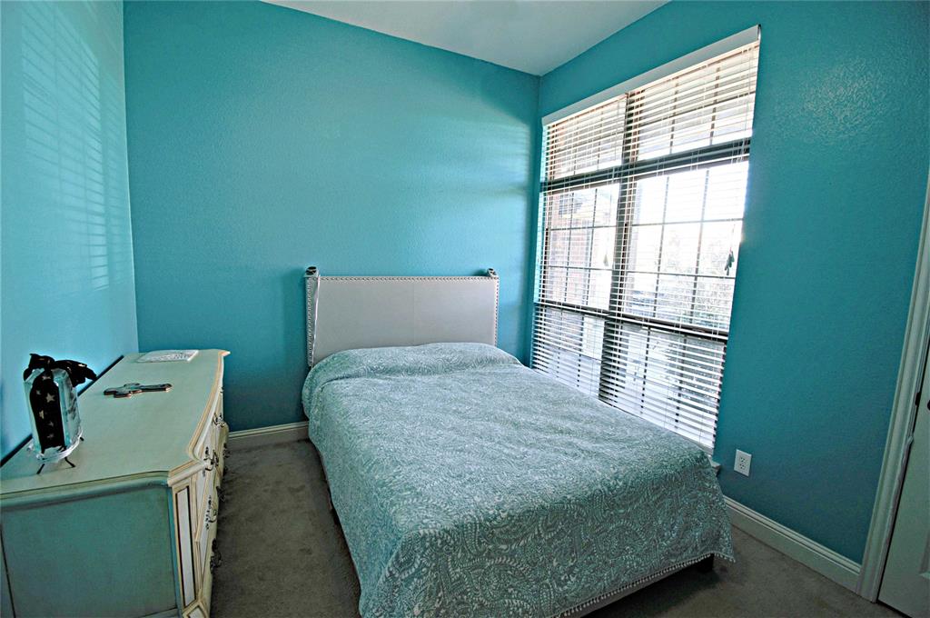 3702 Dogwood Road Melissa, TX 75454 - Photo 12 of 24 a bedroom with a bed and a window