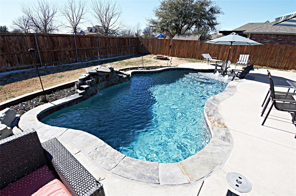 3702 Dogwood Road Melissa, TX 75454 - Photo 21 of 24 a view of a swimming pool with a patio
