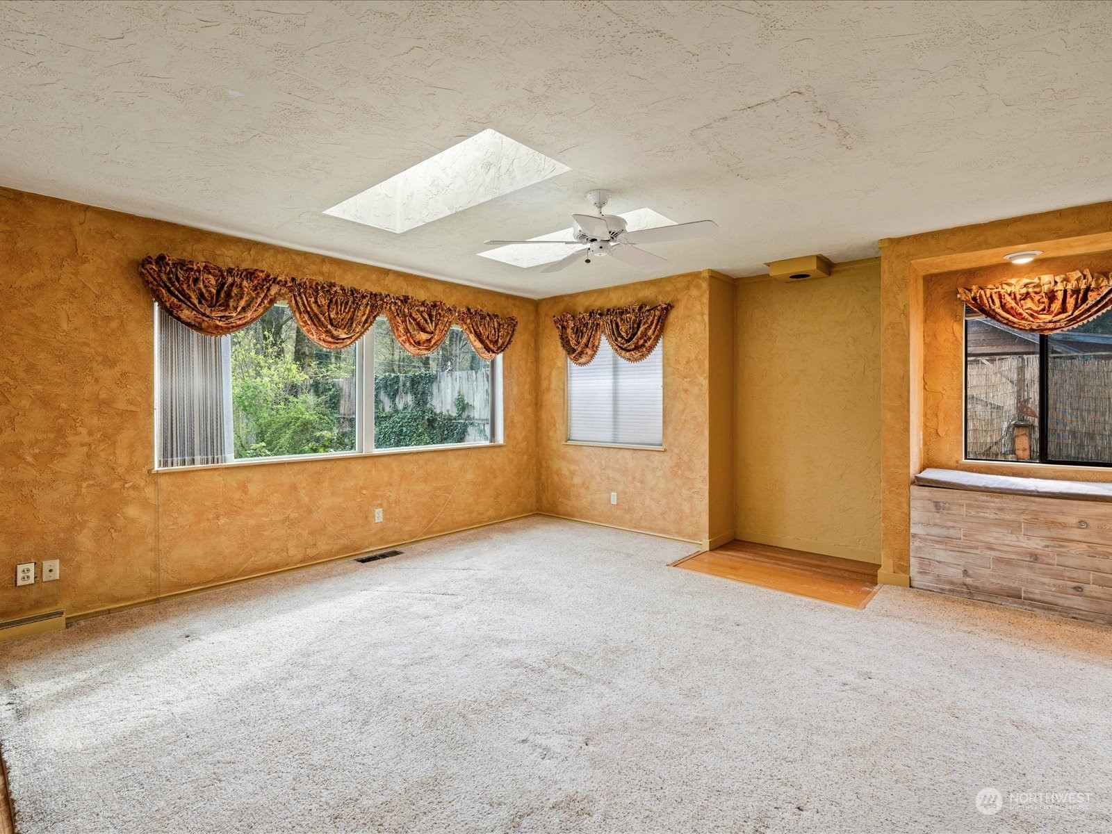 16446 Southeast Jones Road Renton, WA 98058 - Photo 5 of 40 an empty room with windows