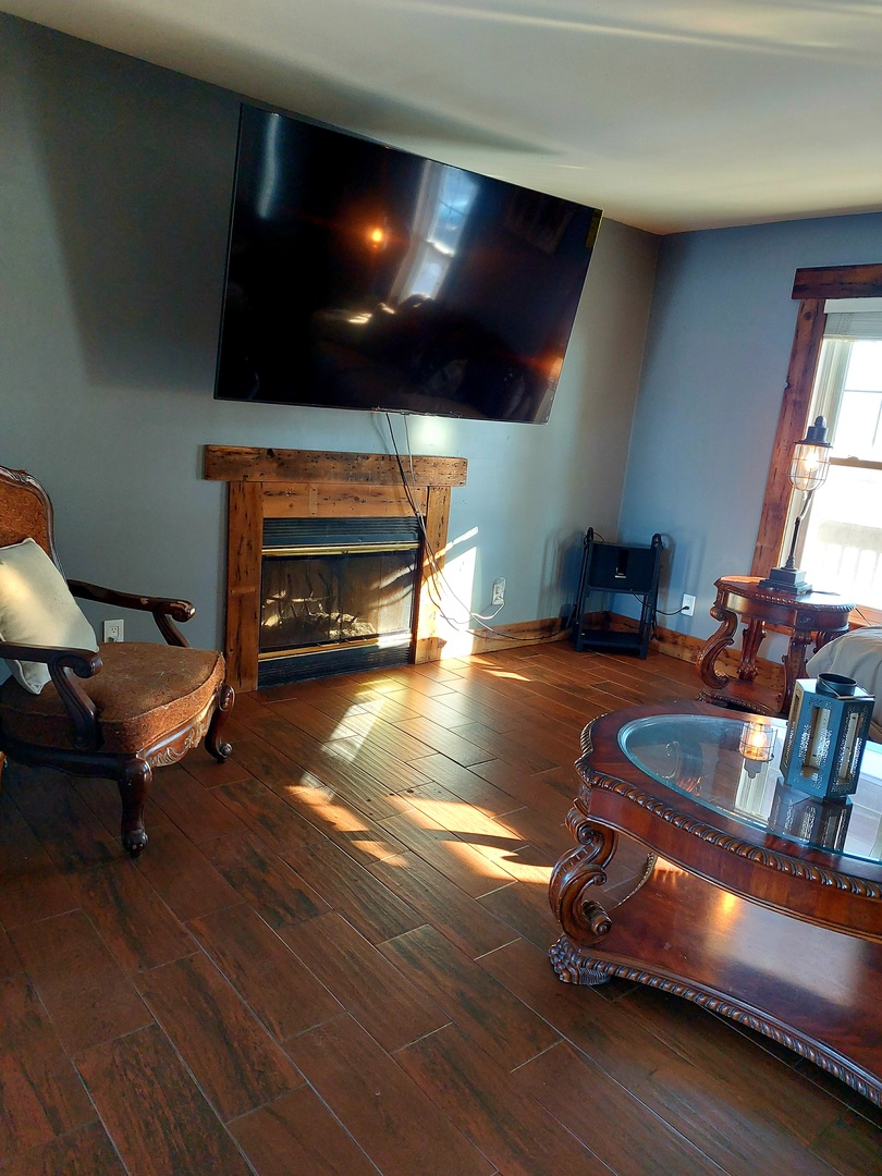 44-w046 Rohrsen Road Hampshire, IL 60140 - Photo 14 of 34 a living room with furniture and a flat screen tv