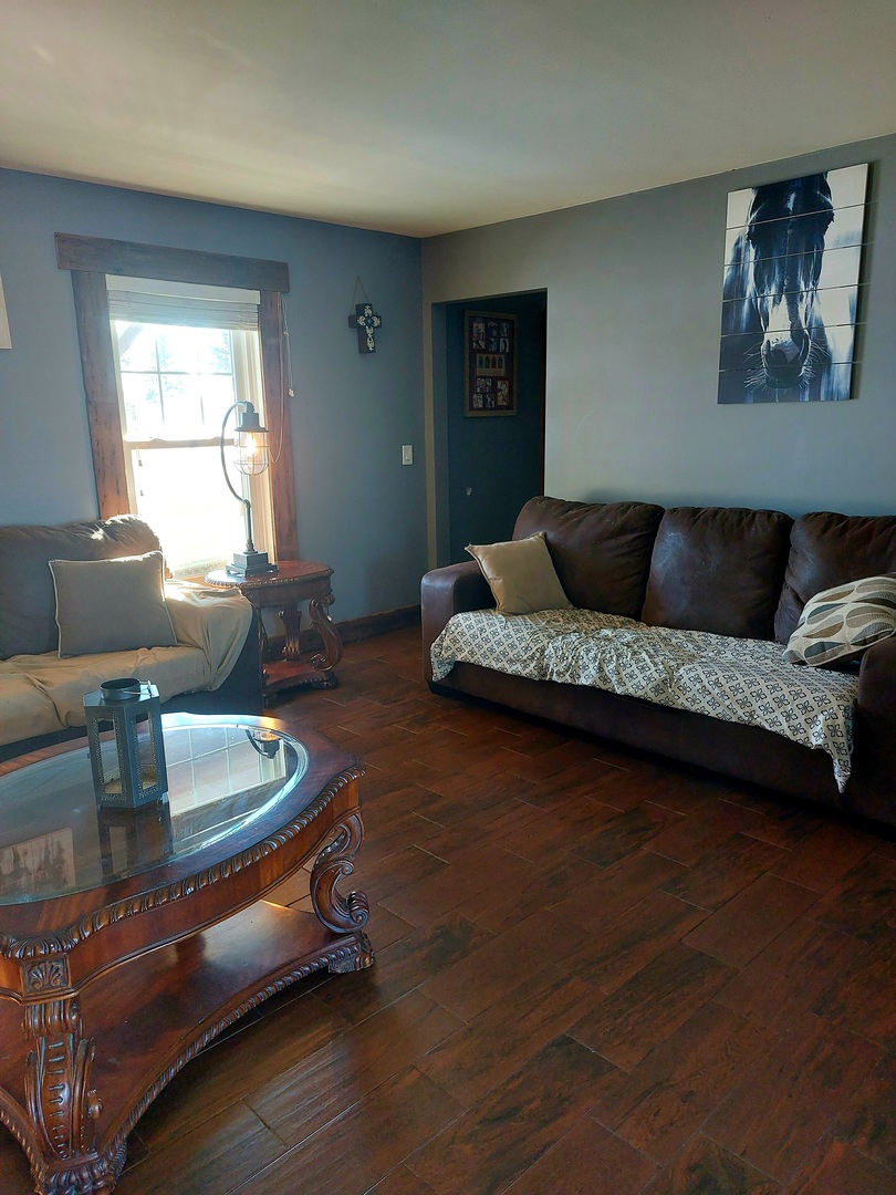 44-w046 Rohrsen Road Hampshire, IL 60140 - Photo 17 of 34 a living room with furniture and a hard wood floor