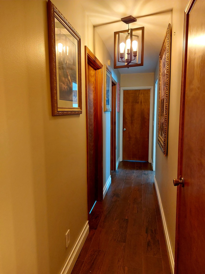 44-w046 Rohrsen Road Hampshire, IL 60140 - Photo 20 of 34 an entryway door with hallway a mirror and a window
