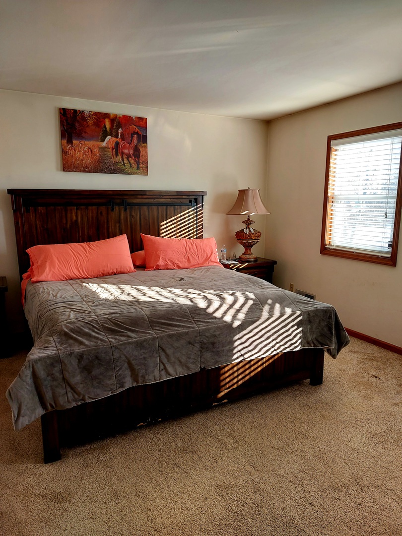 44-w046 Rohrsen Road Hampshire, IL 60140 - Photo 22 of 34 a bedroom with a bed and window