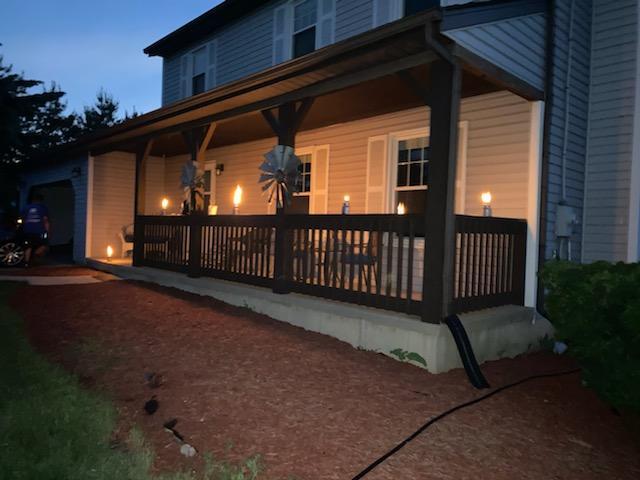 44-w046 Rohrsen Road Hampshire, IL 60140 - Photo 33 of 34 a view of a porch with a small yard