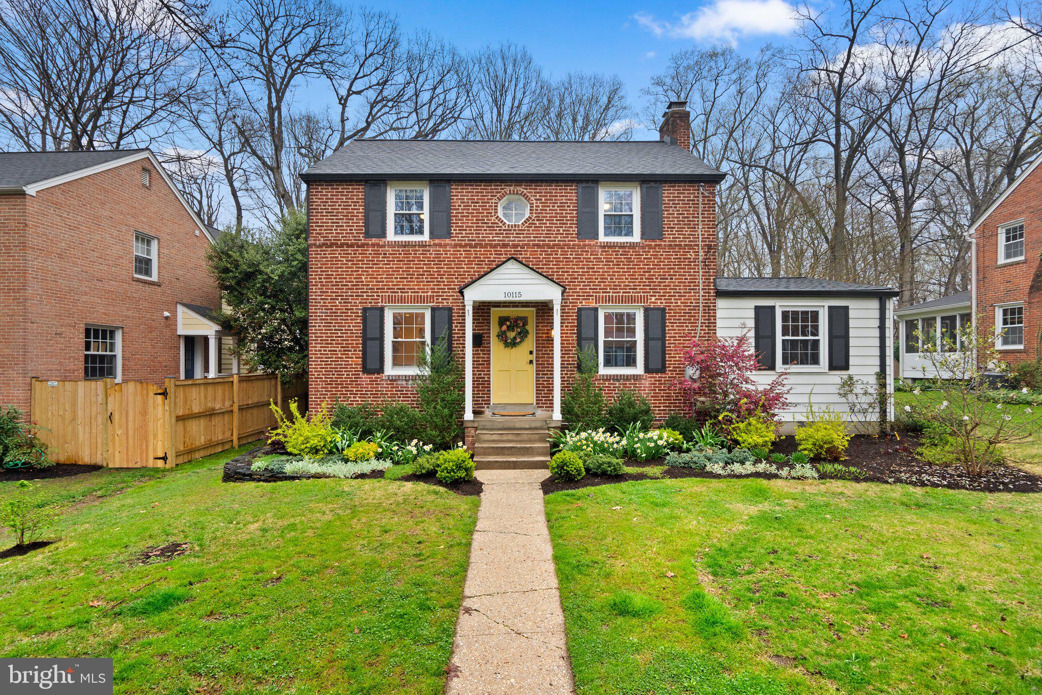 10115 Big Rock Road Silver Spring, MD 20901 - Photo 1 of 43 a front view of a house with a garden and plants