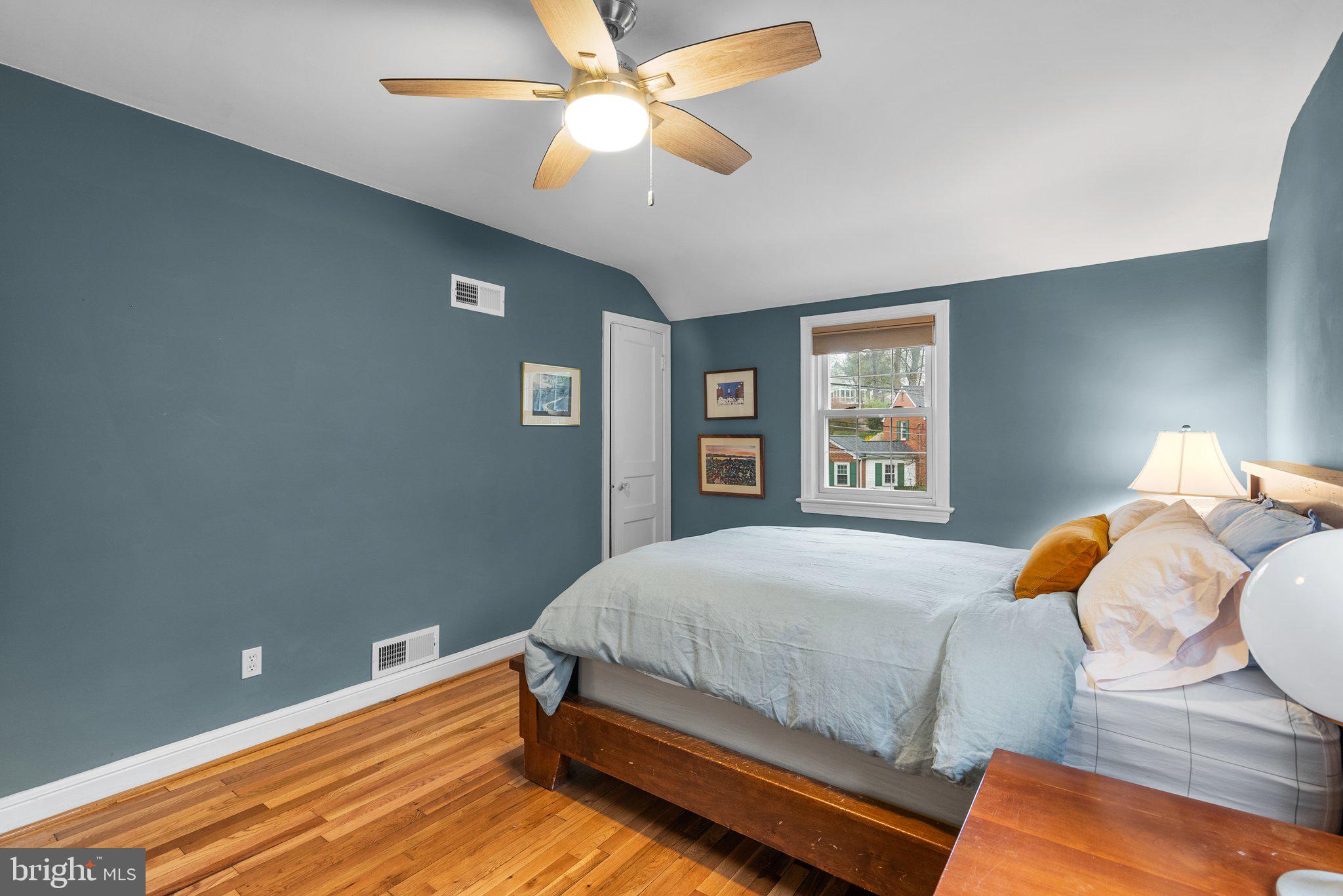10115 Big Rock Road Silver Spring, MD 20901 - Photo 24 of 43 a bedroom with a bed and a window