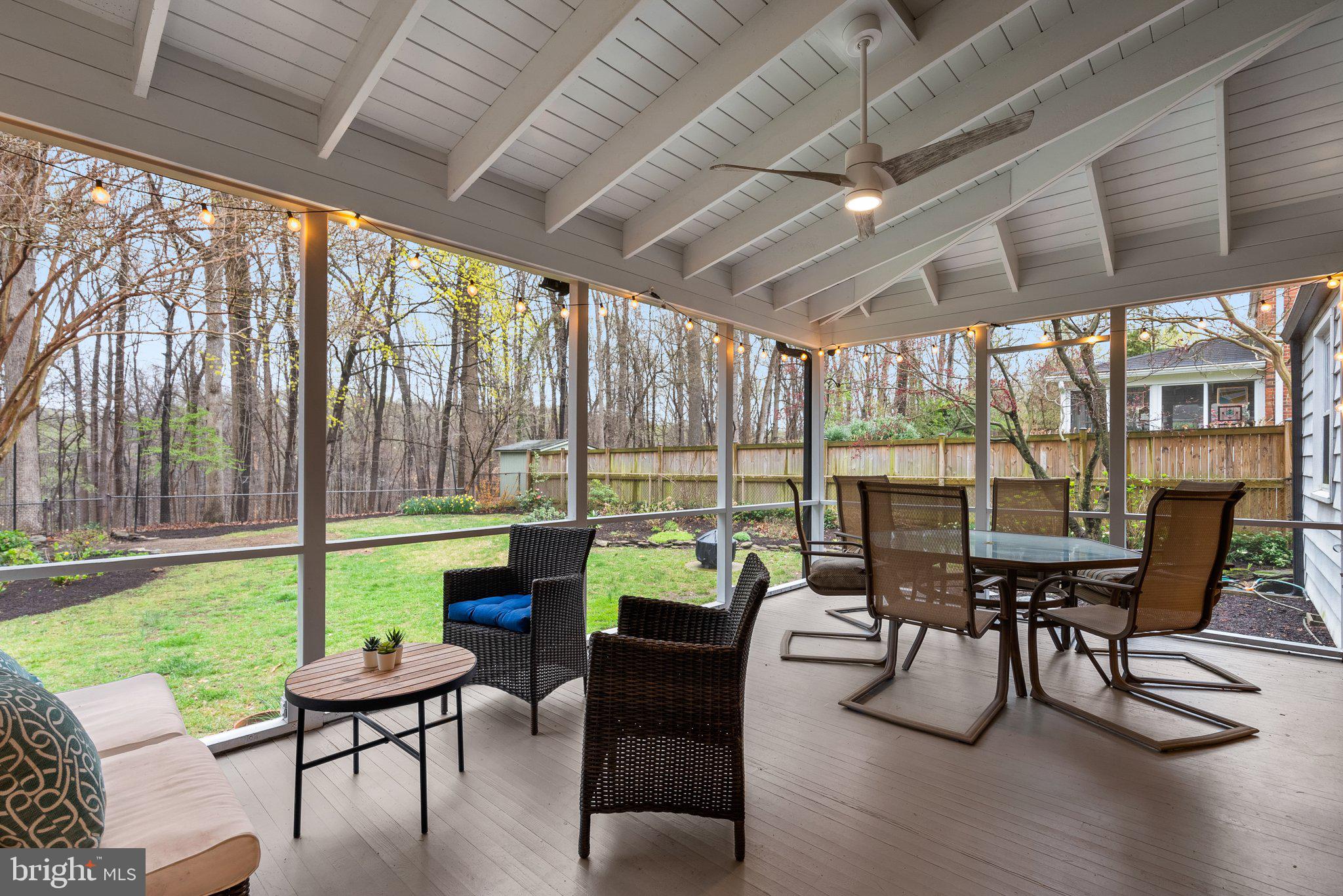 10115 Big Rock Road Silver Spring, MD 20901 - Photo 34 of 43 a balcony with furniture and a garden