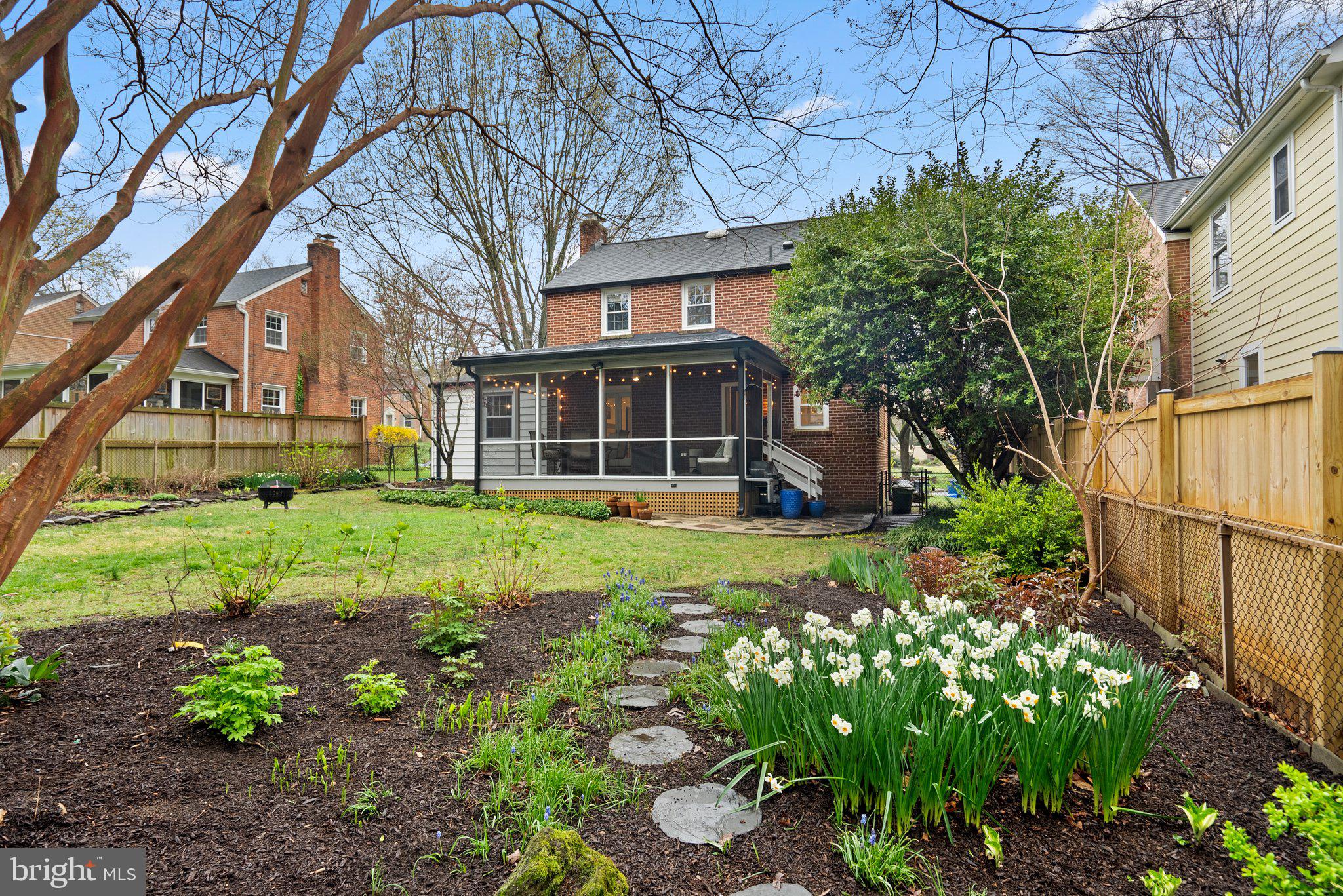 10115 Big Rock Road Silver Spring, MD 20901 - Photo 5 of 43 a view of a house with a yard and sitting area