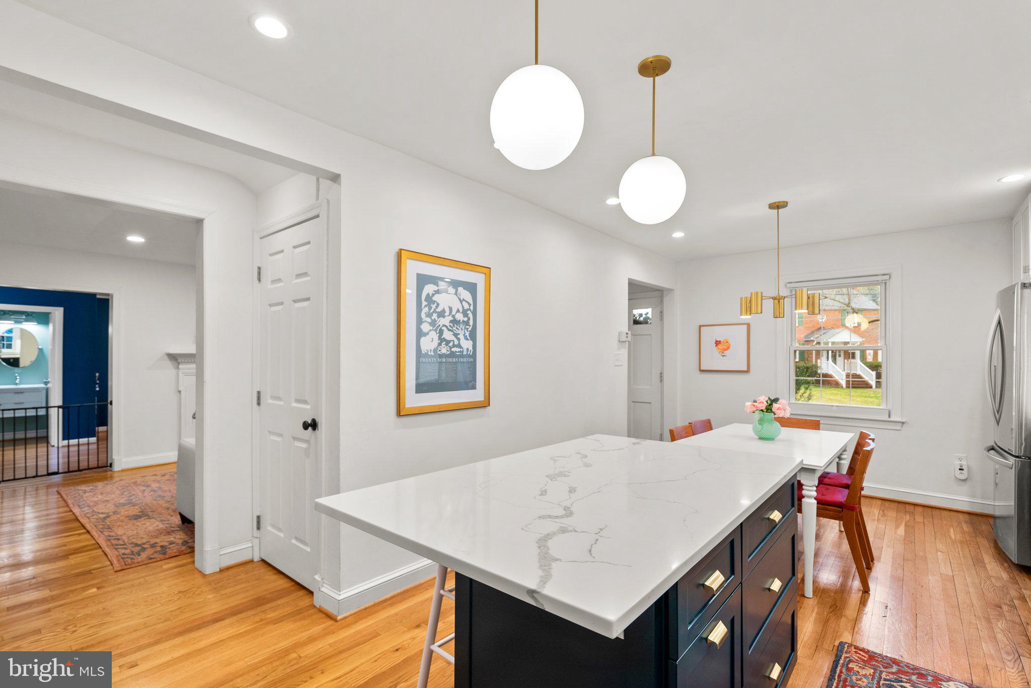 10115 Big Rock Road Silver Spring, MD 20901 - Photo 6 of 43 a view of a dining room with furniture and a chandelier