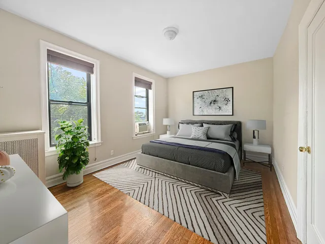 a kitchen with a refrigerator and a stove top oven