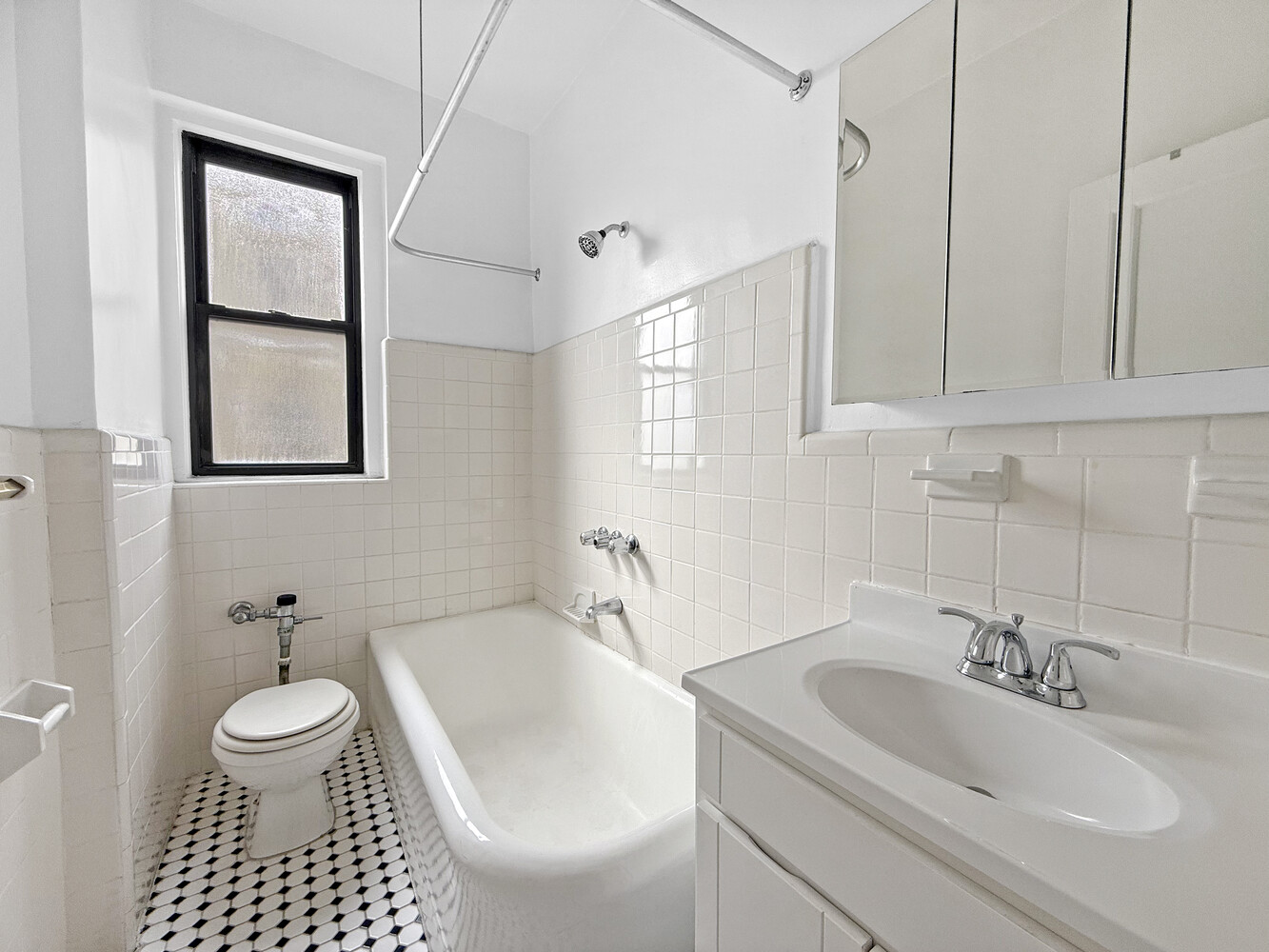 80 Winthrop Street, Unit L5 Brooklyn, NY 11225 - Photo 14 of 19 a bathroom with a sink toilet and shower