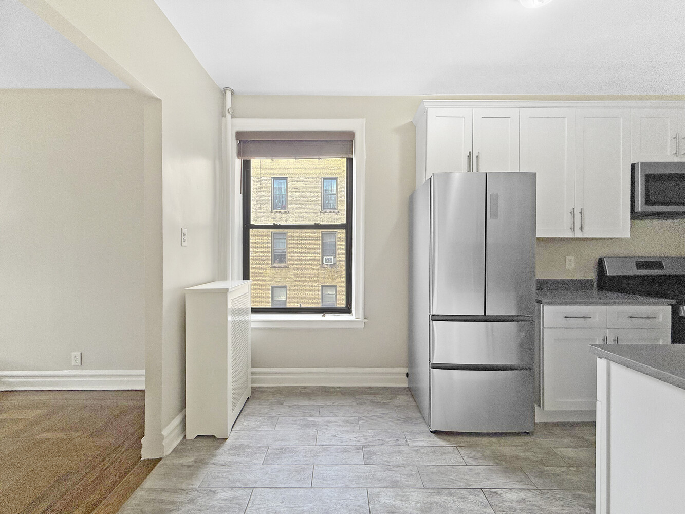 80 Winthrop Street, Unit L5 Brooklyn, NY 11225 - Photo 8 of 19 a kitchen with a refrigerator sink stove and cabinets
