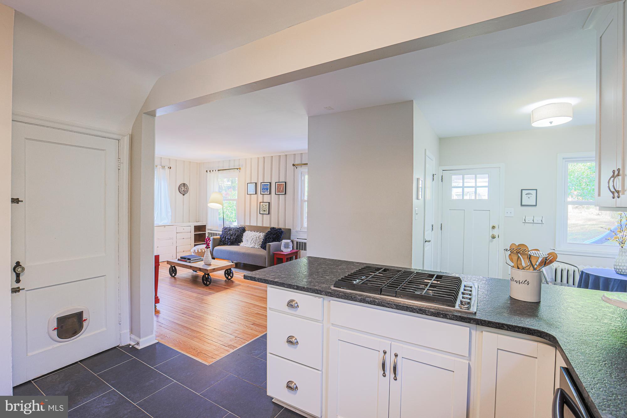 5508 South Bend Road Baltimore, MD 21209 - Photo 24 of 72 Kitchen looking into den, back entrance + 1/2 bath