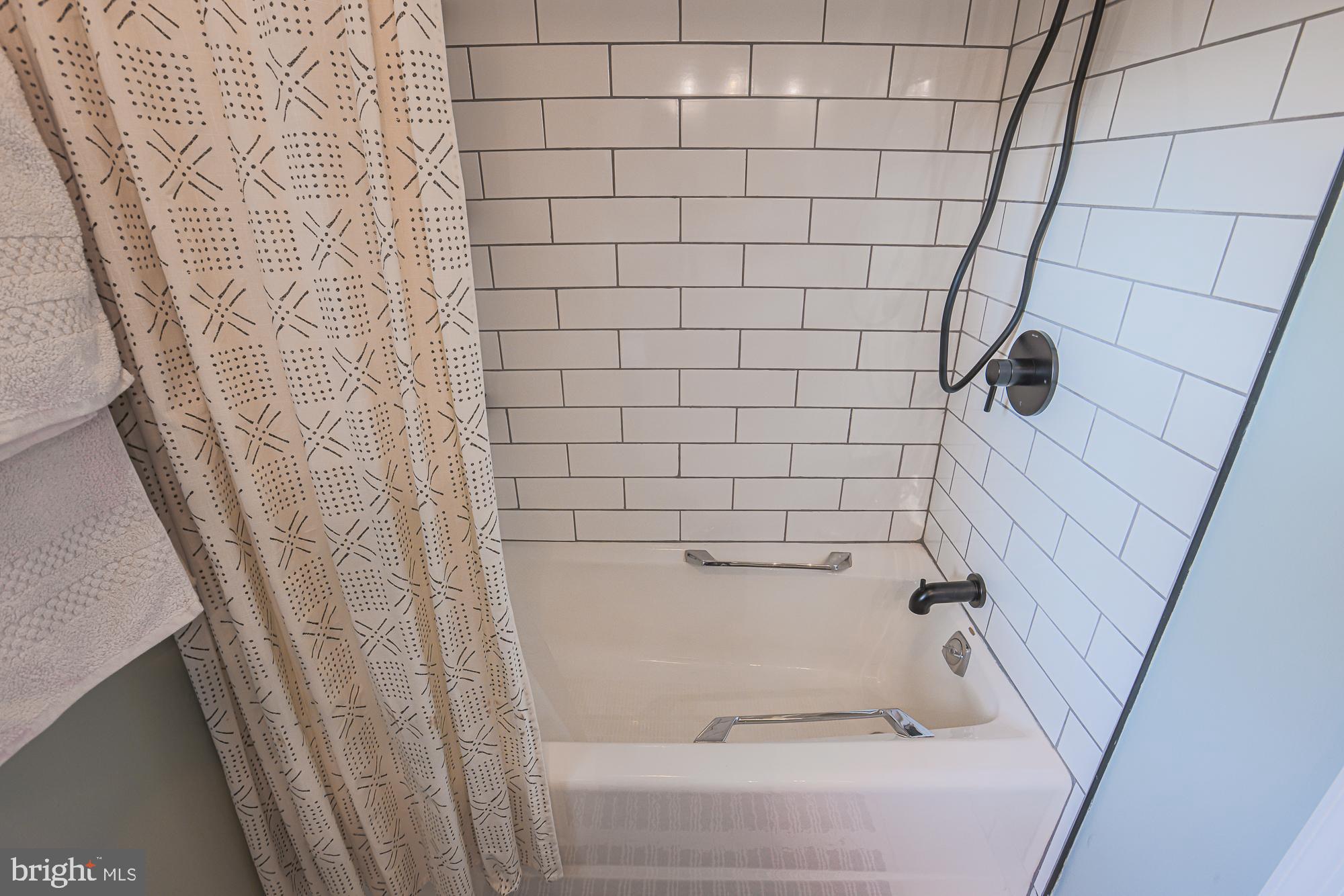 5508 South Bend Road Baltimore, MD 21209 - Photo 57 of 72 Renovated full bathroom with shower/tub combo