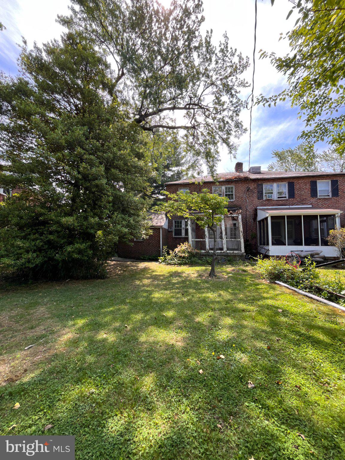 5906 Ayleshire Road Baltimore, MD 21239 - Photo 36 of 41 Semi detached rear view with raised porch.