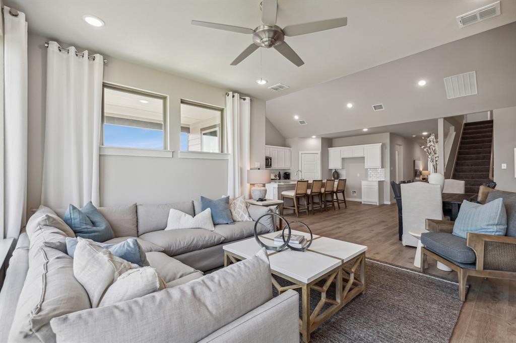 1129 Del Rio Drive Lavon, TX 75166 - Photo 11 of 28 Living room in the Wimbledon home plan by Trophy Signature Homes – REPRESENTATIVE PHOTO