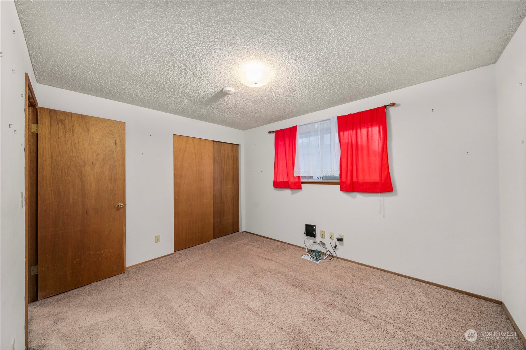 903 Southwest 104th Street Seattle, WA 98146 - Photo 12 of 26 a view of a room with painted walls