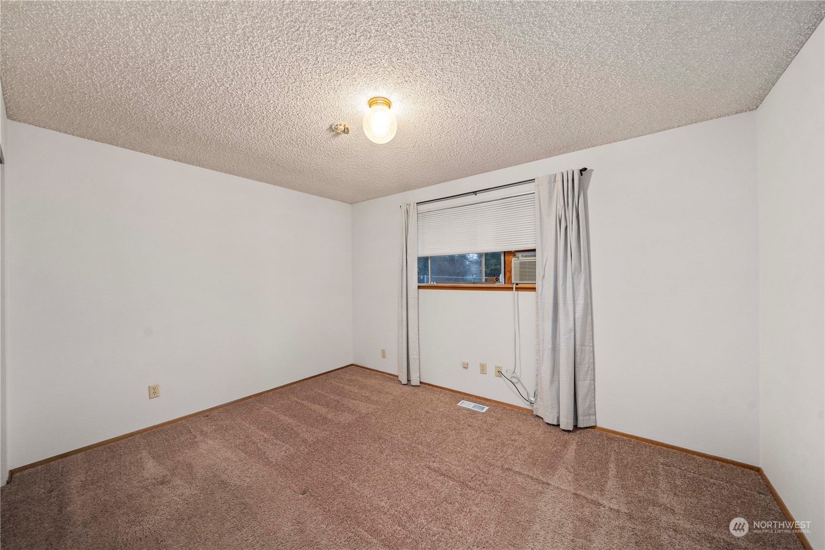 903 Southwest 104th Street Seattle, WA 98146 - Photo 13 of 26 a view of an empty room